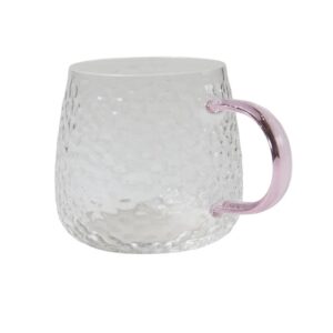 Glas med rosa handtag