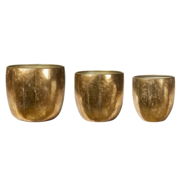 Guldig metall kruka